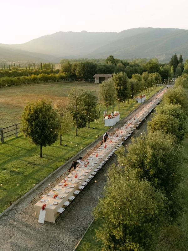 Elegant outdoor wedding reception table at Il Borro in Tuscany, Italy, planned by wedding planner Chiara Sernesi